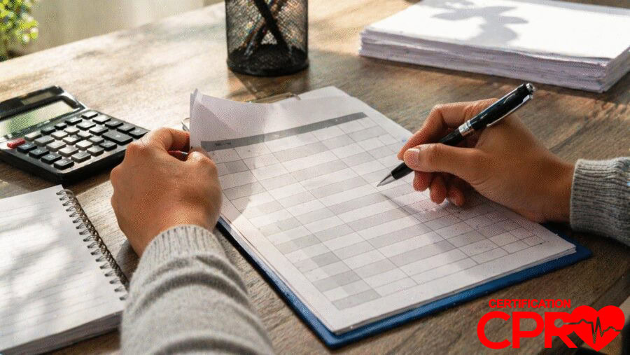 Person filling out a form for CPR certification in Baltimore, Maryland.
